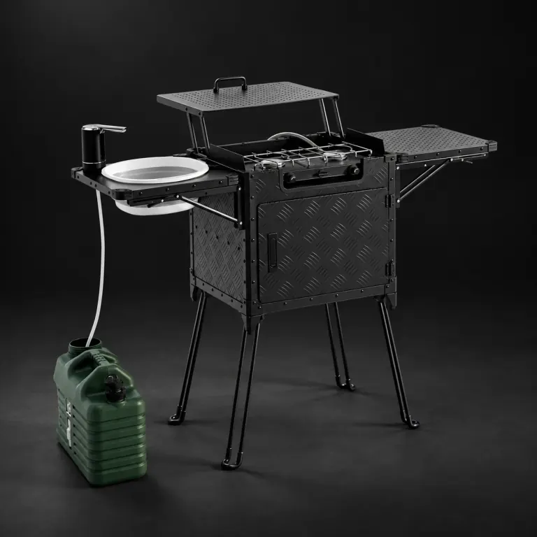 Studio concept of the black folding kitchen with stove, sink and storage